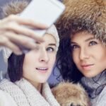Two women in winter clothes.
