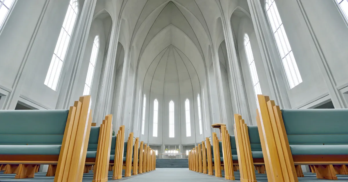 white ceiling and blue benches Inside of The Hallgrimskirkja Church, Reykjavik