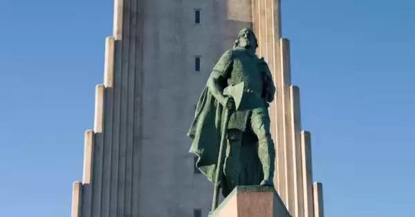 Leifur Eiríksson Statue of a man in front of the church in Iceland.