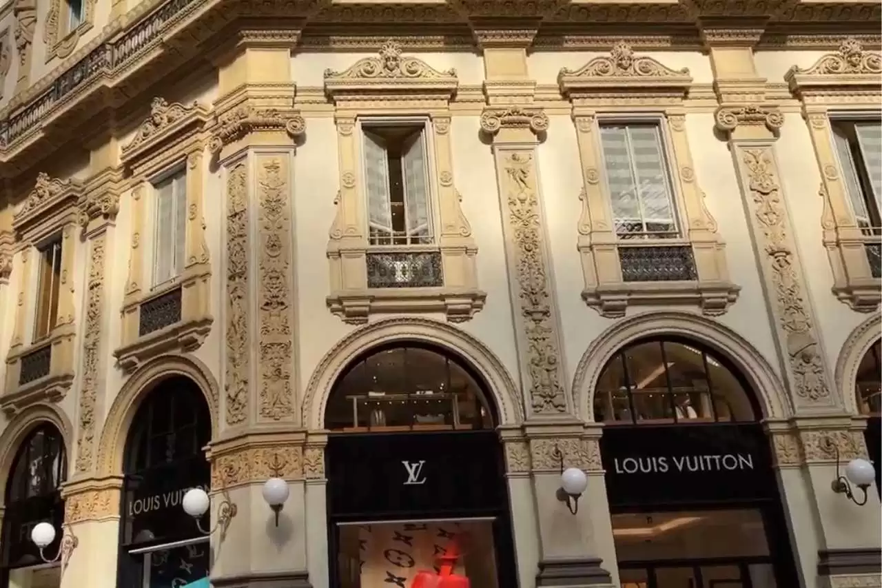 Galleria Vittorio Emanuele II Mall with many windows of high end fashion shop.