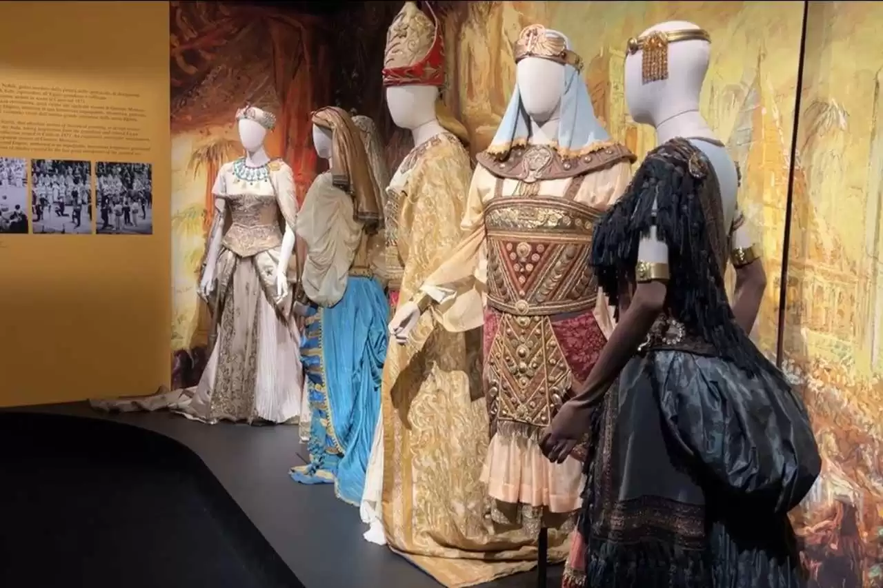 a group of mannequins wearing clothing in La scala opera house in Milan Italy.
