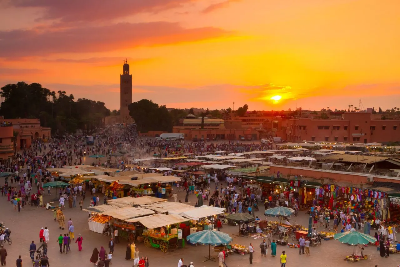 a large crowd of people in Jamaa El Fna, Marrakesh, Morocco
