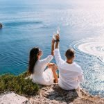 A couple in love celebrates their engagement on the seashore