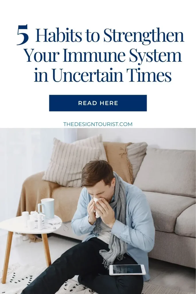 A sick man sitting on the floor in front of a couch with atext overlay that read as 5 Habits to Strengthen Your Immune System in Uncertain Times.
