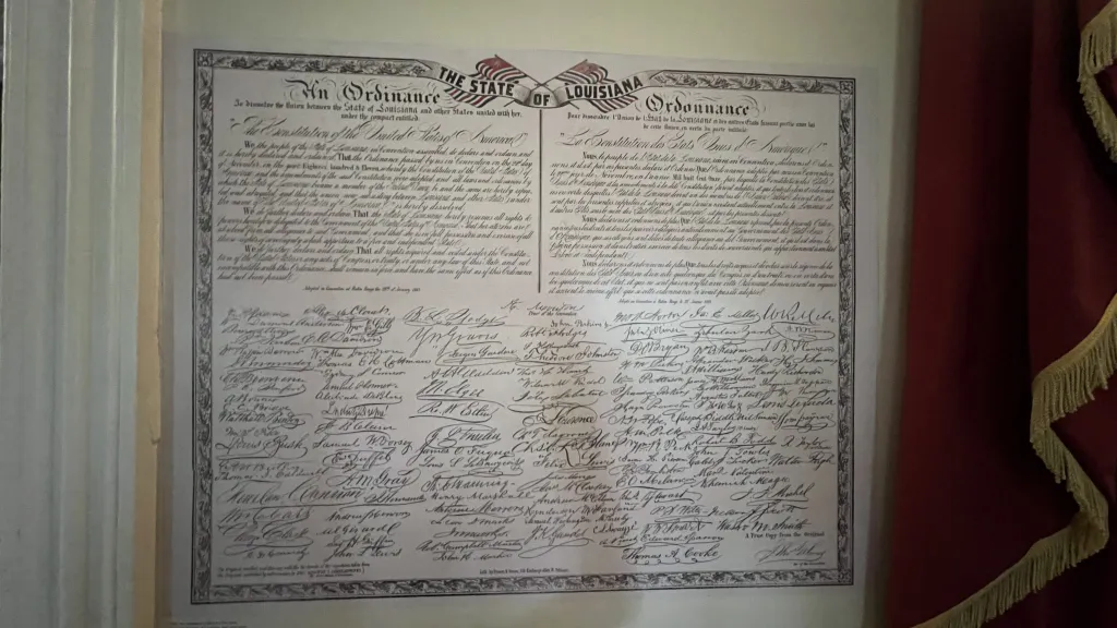 A copy of the ordinance of secession with his signature hangs on the wall.