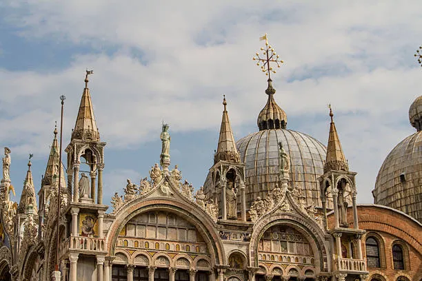 Saint Mark’s Basilica building with many spires on top of it