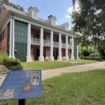 Shadows on Teche Exterior with columns and columns on the front of it.