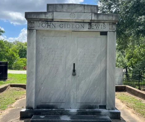 a monument of John Gideon Lewis with writing on it