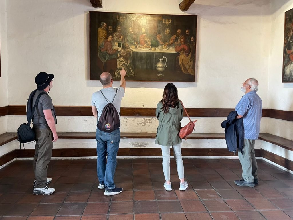 KarenLookingatArtinSanDiegoConvent scaled