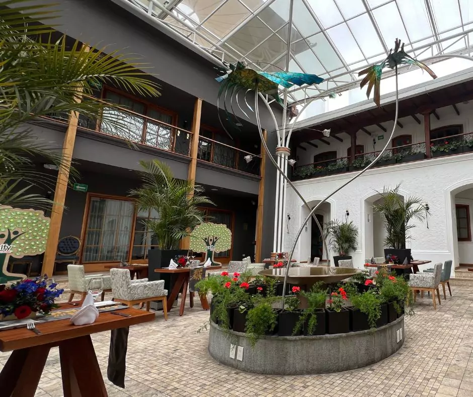 Elegant courtyard dining area at Hotel Mama Cuchara by Art Hotels
