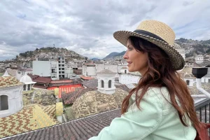 Karen overlooking the city of Quito while she explore Ecuador on a Hero's Journey through Arts and Culture.