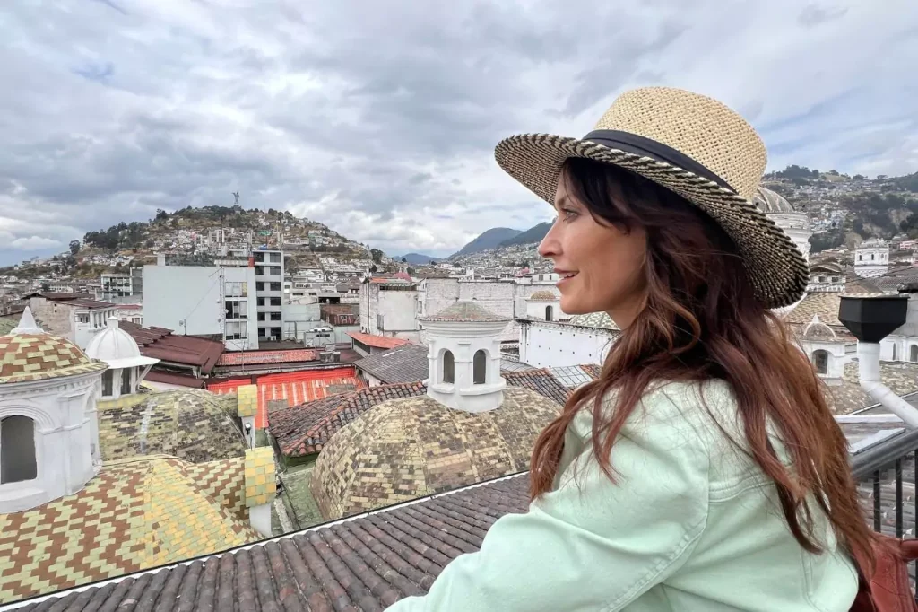 Karen overlooking the city of Quito while she explore Ecuador on a Hero's Journey through Arts and Culture.