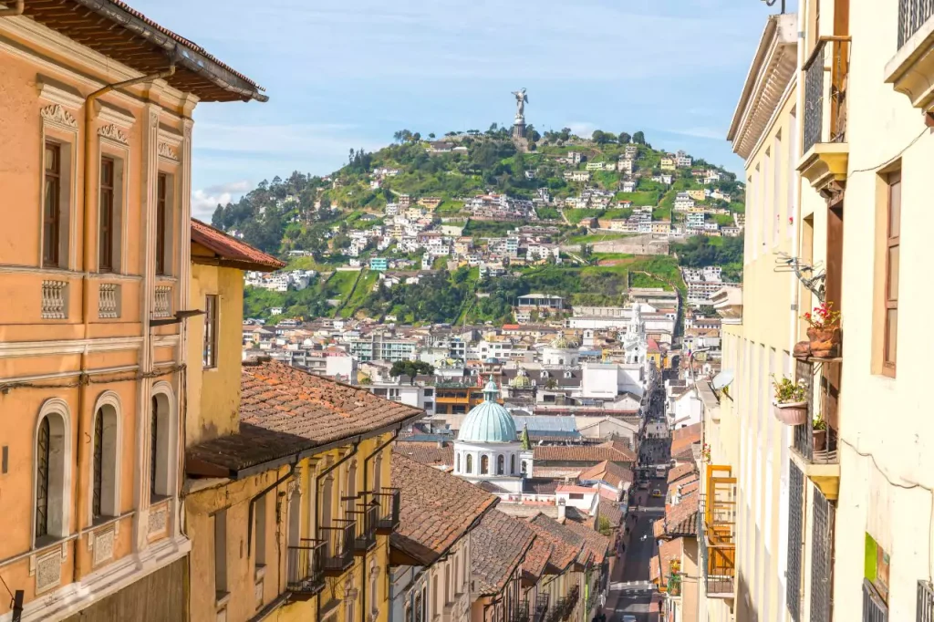 High angle view of the old town on sunny day as best time to visit Quito.