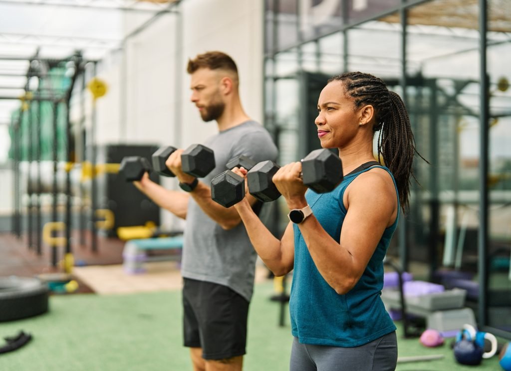 gym sport fitness exercise health woman weight training dumbbell weightlifting bodybuilding