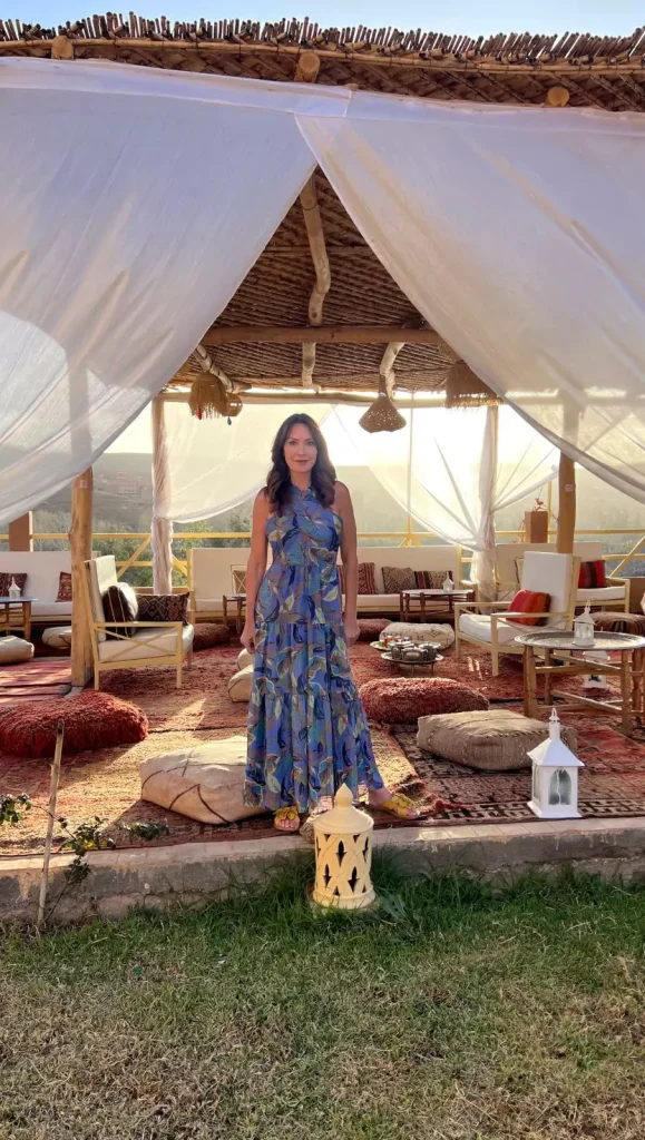 Karen wearingwist halter maxi dress at Riad Sahara Star in the Atlas Mountains