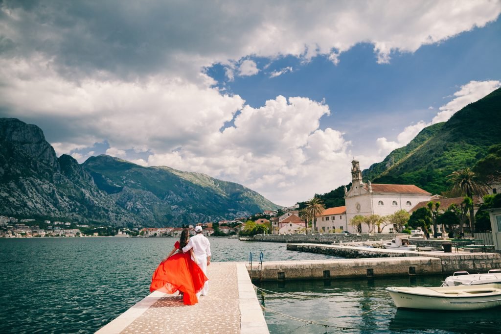 beautiful couple travel in Europe with mountains view