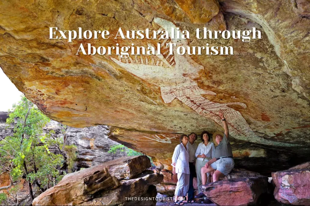 Travelers exploring Aboriginal rock art at a sacred site in Arnhem Land, guided by an Indigenous expert, showcasing authentic cultural tourism in Australia. With text reads as "Explore Australia through Aboriginal Tourism"