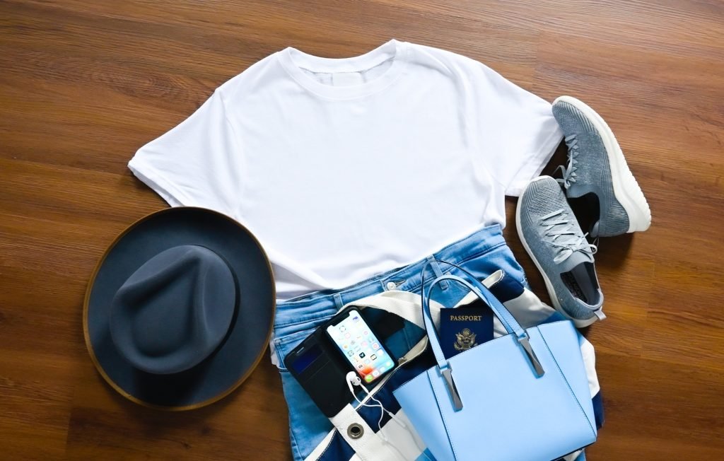 Flat lay wardrobe for international travel