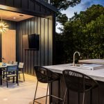 Modern outdoor kitchen and dining area