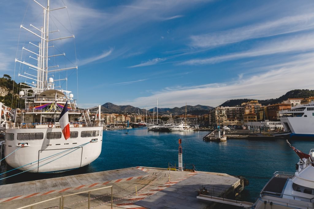 NICE, FRANCE - 17 SEPTEMBER 2017: ships in harbour of old european city located on seashore
