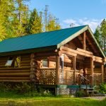 Wooden hut in an autumn forest , cabin off grid , wooden cabin woods British Colombia Canada Autumn