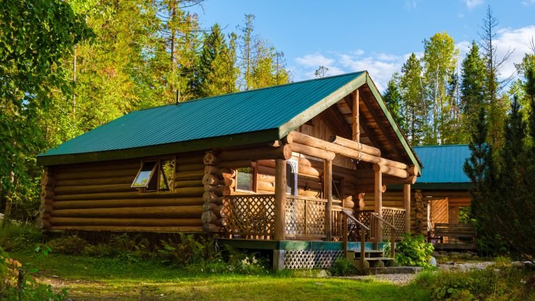 Wooden hut in an autumn forest , cabin off grid , wooden cabin woods British Colombia Canada Autumn