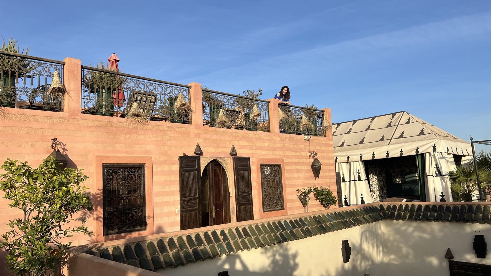 Rooftop terrace near Djemaa el-Fna in Marrakech at sunset, a popular evening spot for visitors enjoying nightlife during a 2 day in Marrakech trip.