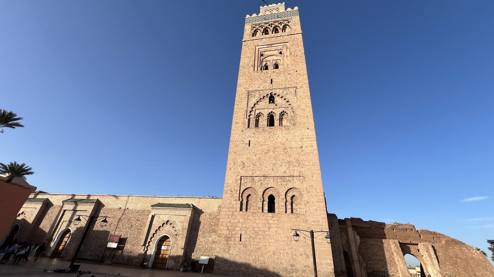 Koutoubia Mosque in Marrakech under a clear blue sky, a must-see landmark during 2 days in Marrakech and a prime example of Almohad architecture.