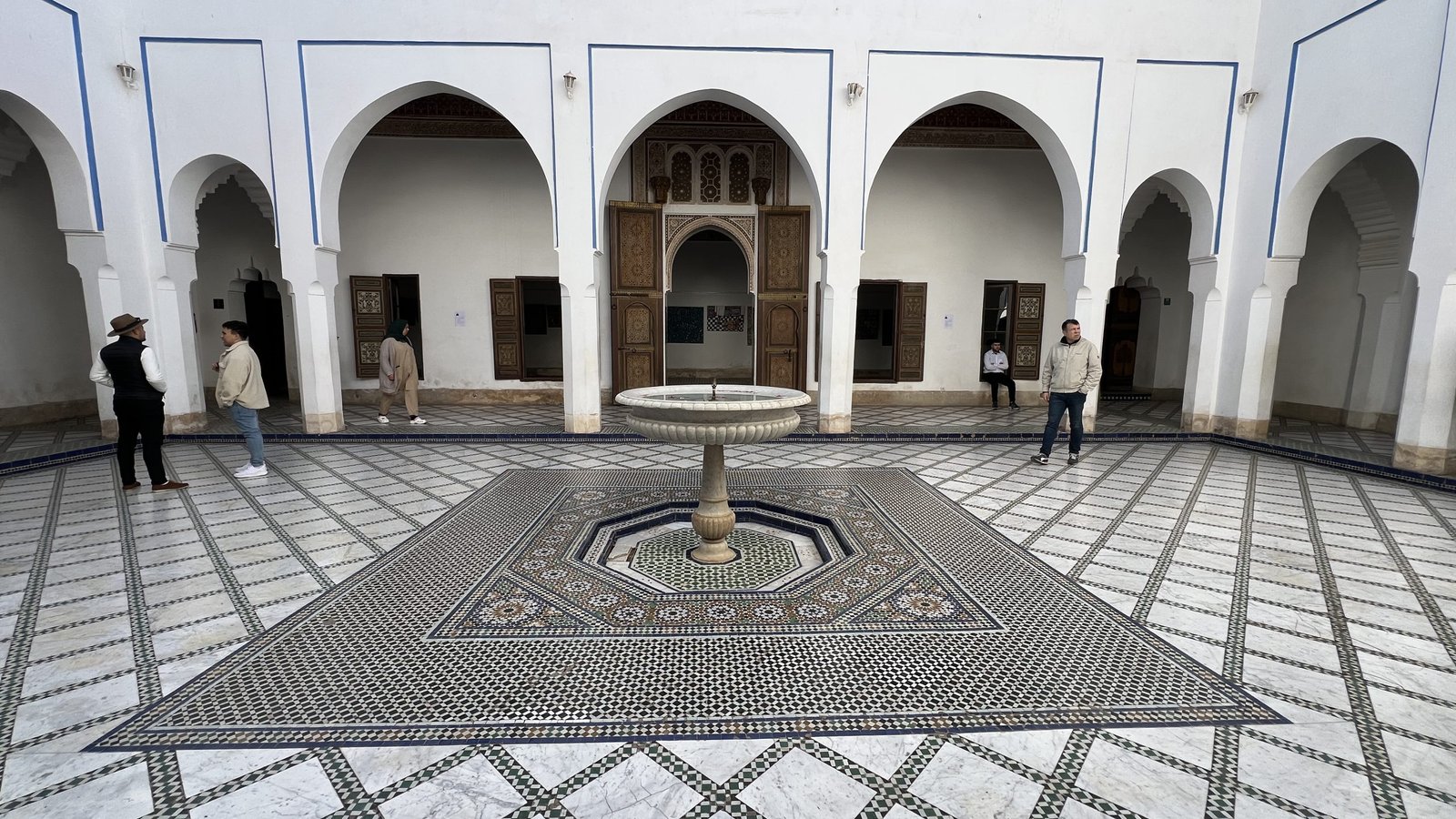Courtyard with mosaic tile fountain inside Bahia Palace in Marrakech, a popular cultural site often included in a 2 day in Marrakech travel itinerary.