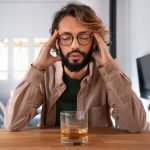 Alcohol abuse concept. Man with glass.