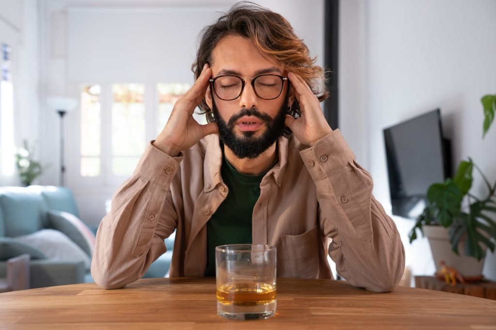 Alcohol abuse concept. Man with glass.