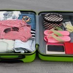 Packing things for travel in a suitcase