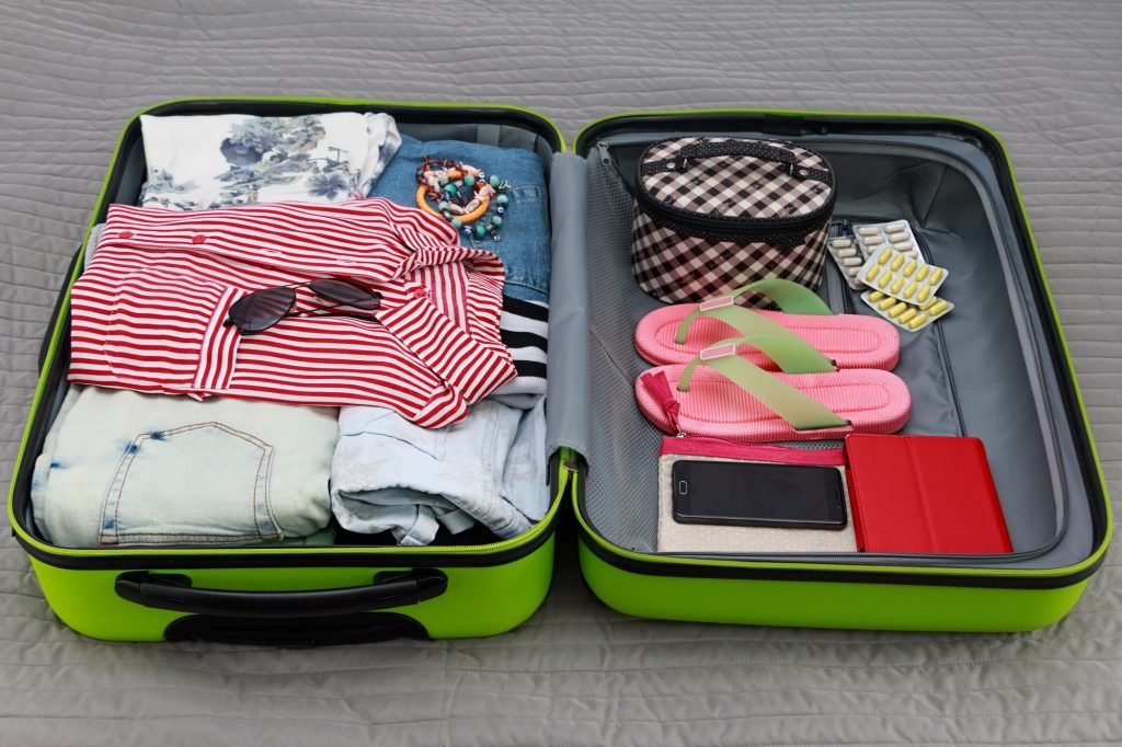 Packing things for travel in a suitcase