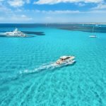 Yacht on the azure seashore in balearic islands