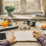 Man writing a journal