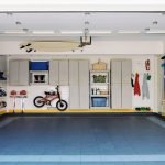 Surfboards and bicycles in empty garage