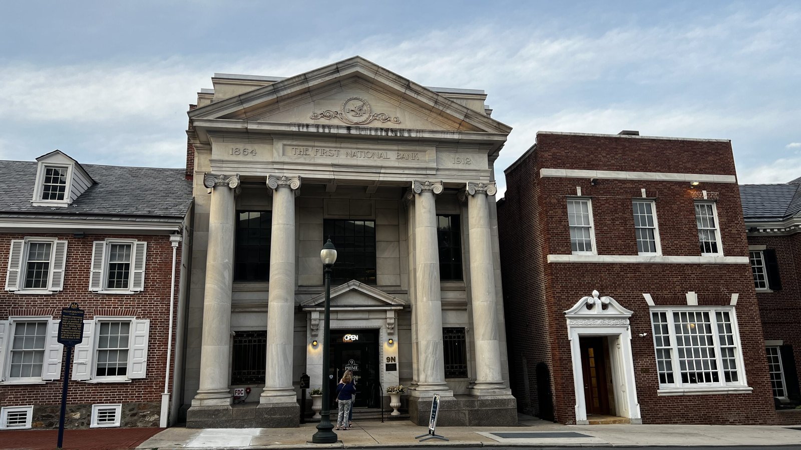 The First National Bank building in West Chester, Pennsylvania, featuring grand columns and historic architecture.