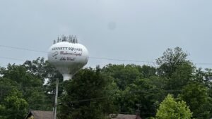 Water tower in Kennett Square, Pennsylvania with the phrase "Mushroom Capital of the World" written on it.