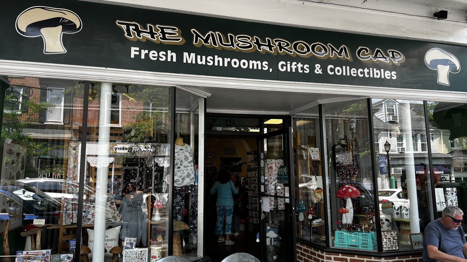 Storefront of The Mushroom Cap in Kennett Square offering mushrooms, gifts, and collectibles.