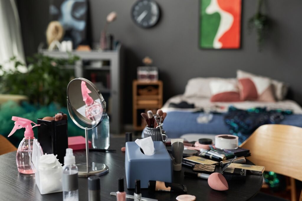 Messy Makeup Table With Mirror and Beauty Supplies