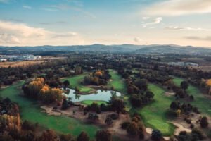 aerial view of autumn color trees golf course 2025 01 29 03 10 22 utc