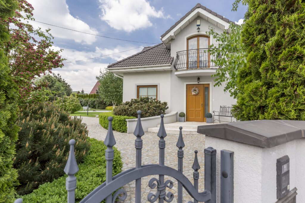 shot of a front of a large elegant house with brow 2025 10 03 11 22 30 utc scaled