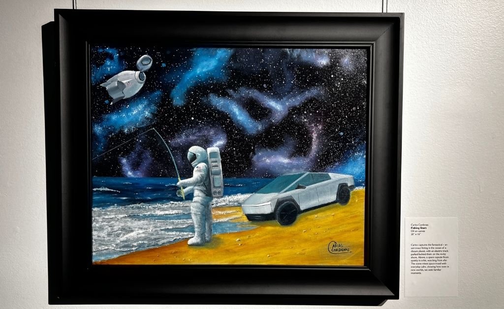 Oil painting titled Fishing Stars by Carlos Cardenas, showing an astronaut fishing on a distant shoreline beneath a star-filled sky, with a space capsule overhead.