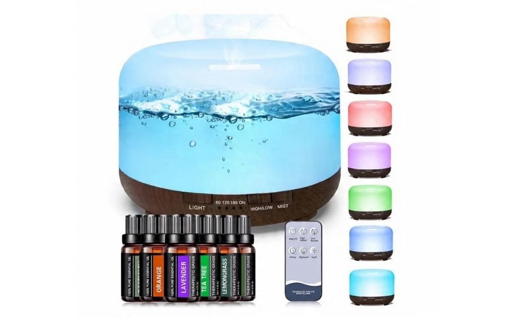 Essential oil diffuser with water tank, color-changing light options, remote control, and assorted essential oil bottles