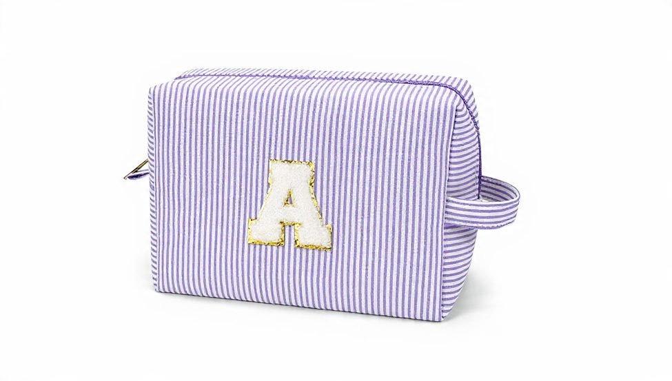 Personalized initial makeup bag with striped fabric design