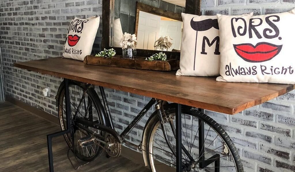 Industrial console table with a vintage bicycle base