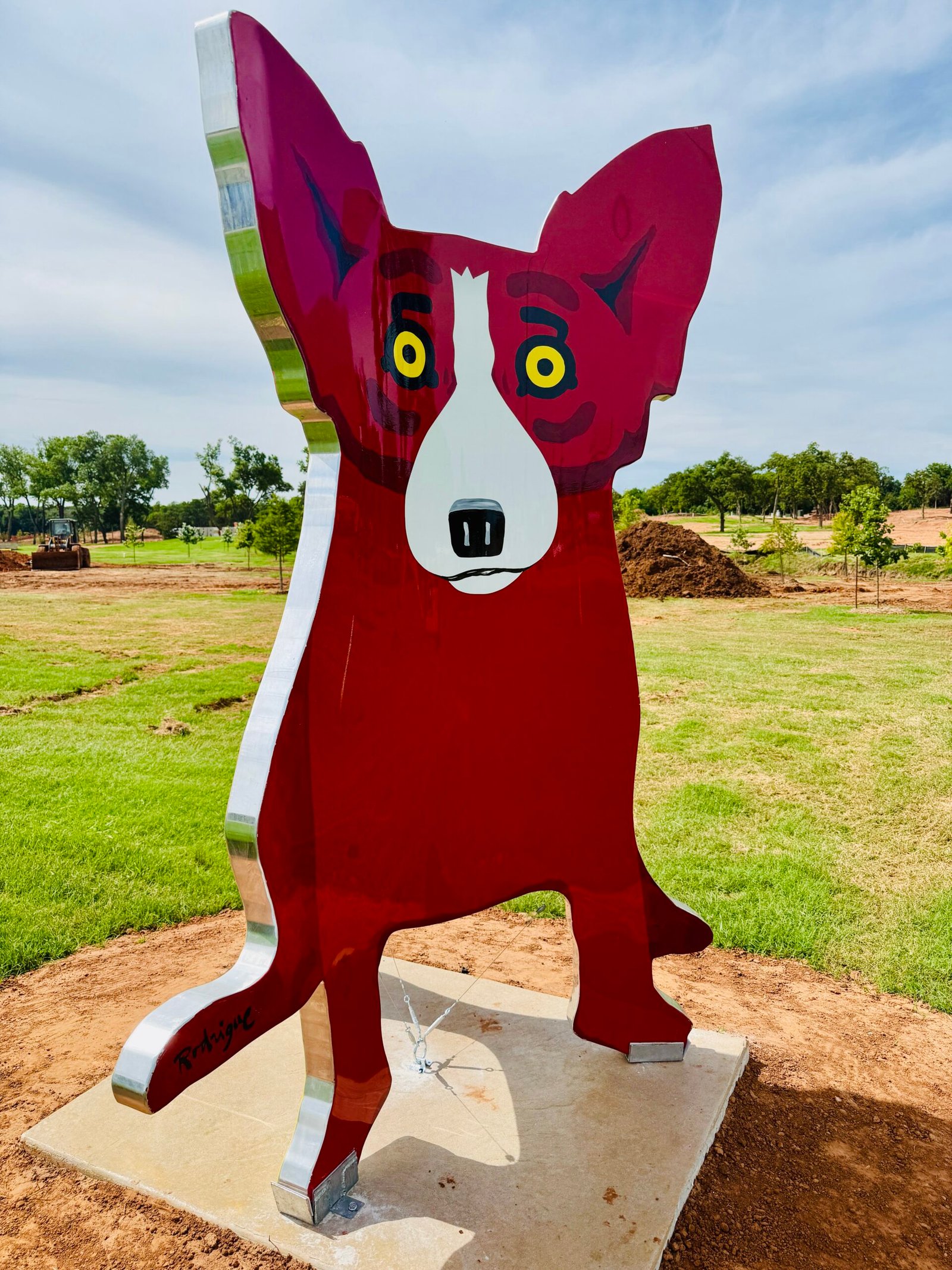 Eight-foot George Rodrigue Blue Dog sculpture installed along historic Route 66 in Edmond, Oklahoma